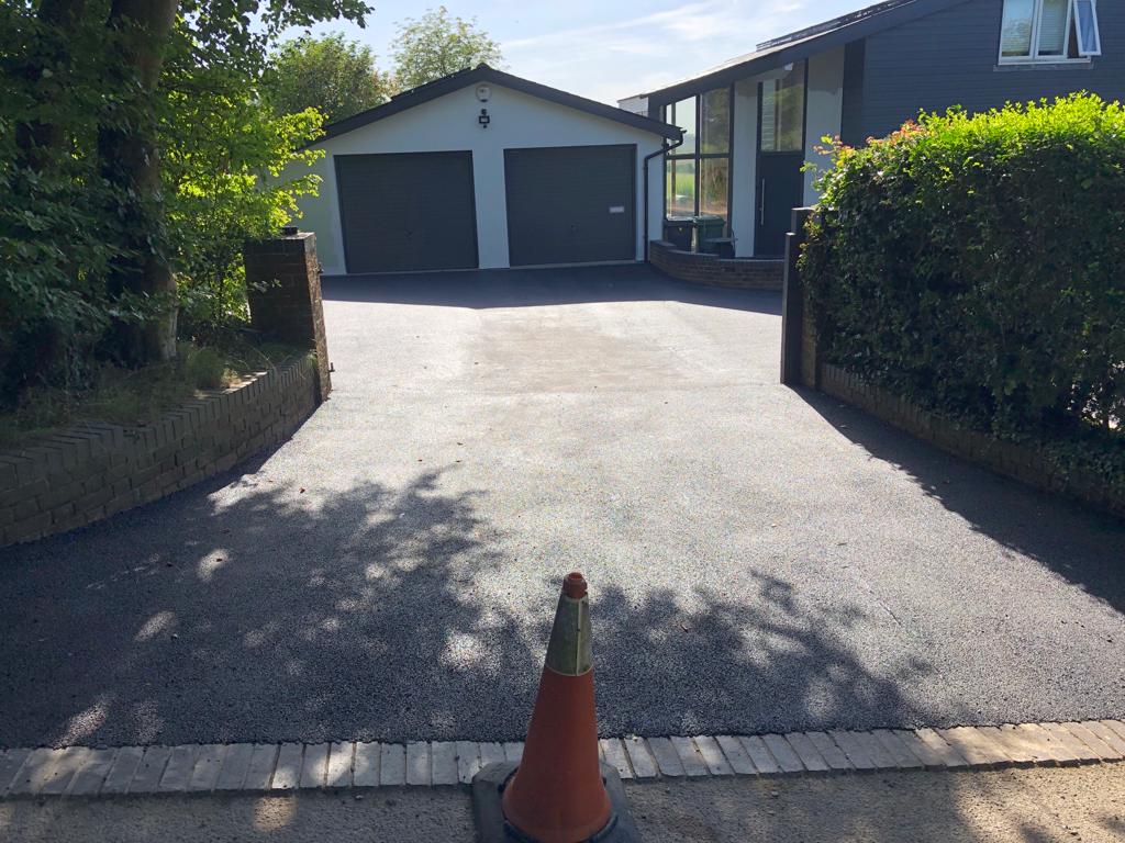 This is a photo of a bitumen driveway which is in the process of being installed by Shepparton Road Tech